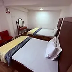 Shiny Cot Triple Guest house