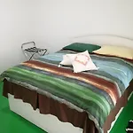 Red Gold & Green House