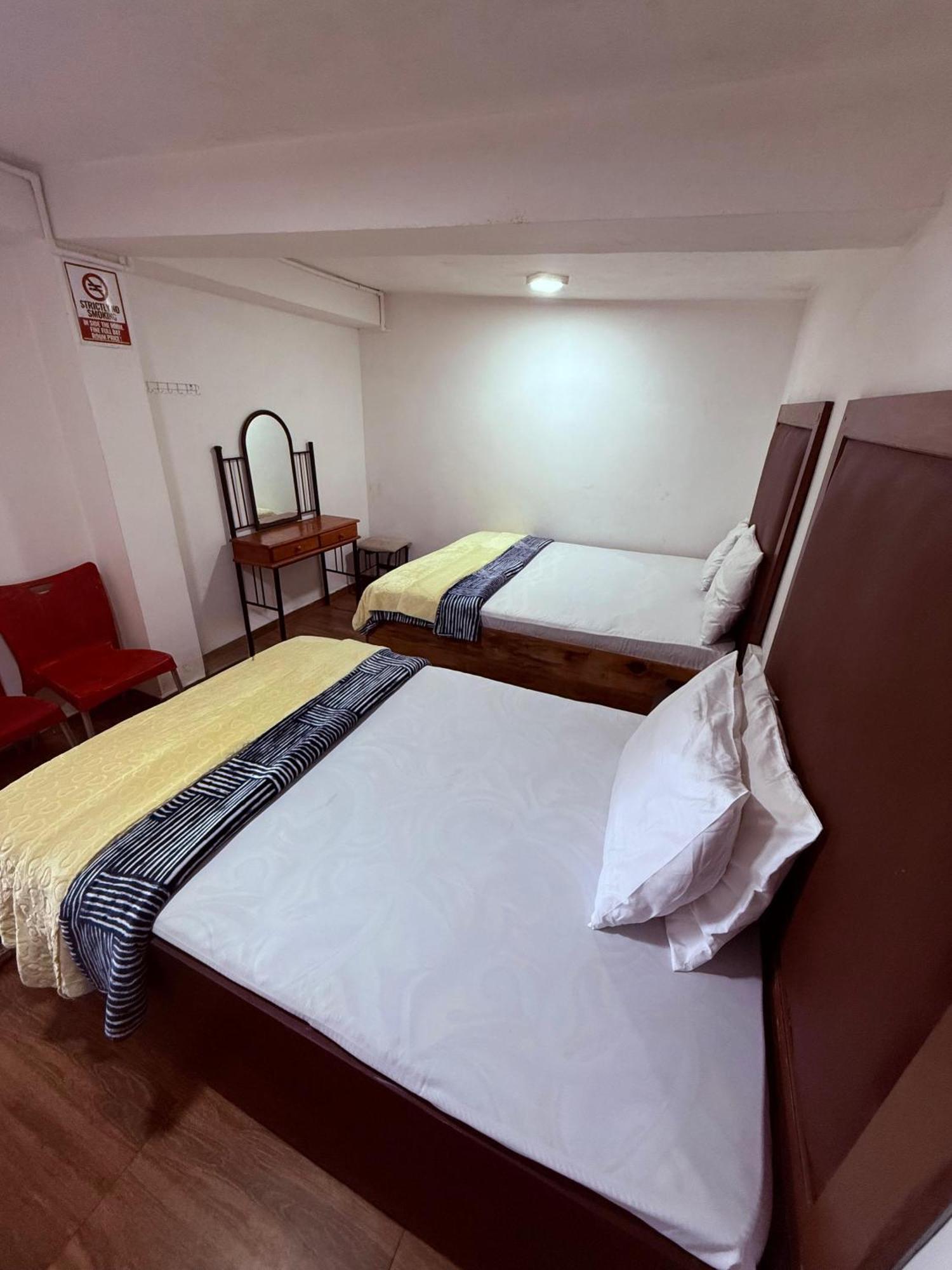 Shiny Cot Triple Guest house